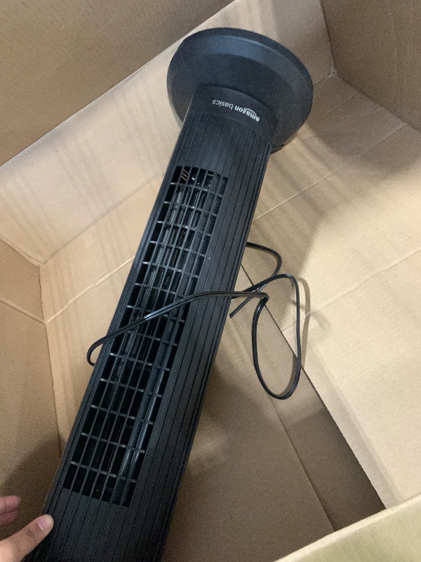 Photo 1 of **amazon basics** 40-inch Bladeless Tower Fan for Bedroom, Standing Fan with Remote Control, 26ft/s, 90° Oscillation, 3 Speed Settings, 27 dB, 3 Modes, 15-Hour Timer, LED Display, Fan that Blows Cold Air, Black