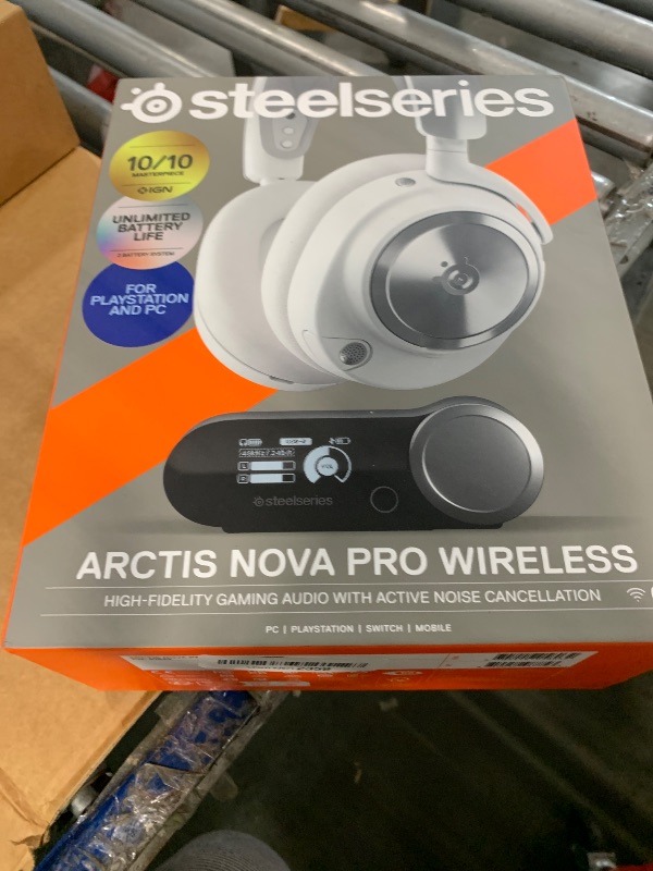 Photo 1 of [Not Wireless - Missing all cables, only headphones and gamedac]
SteelSeries Arctis Nova Pro Omni - Hi-Res Gaming Headset, 96kHz/24bit, ANC, ClearCast Pro Mic, AI Noise Rejection, Mobile App, Mix 2.4GHz + BT, OmniPlay PC+PlayStation+Xbox - Graphite