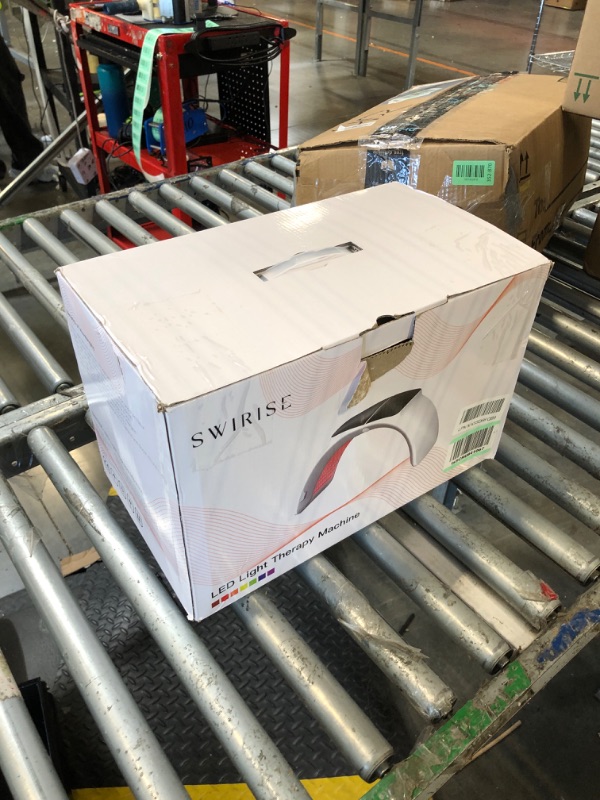 Photo 1 of **NON-FUNCTIONAL**
SWIRISE 7 in 1 Color LED The-rapy Device at Home