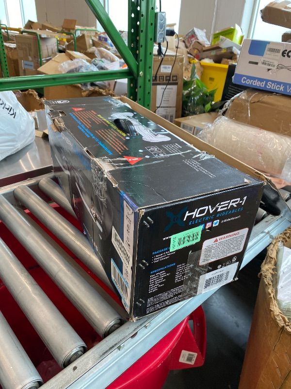 Photo 1 of **UNTESTED**
Hover-1 Superfly Electric Self Balancing Scooter with 7MPH Top Speed, 6 Mile Range, Long Lasting Li-Ion Battery - 5HR Full Charge, Built-In Bluetooth Speaker - Rider Modes: Beginner to Expert