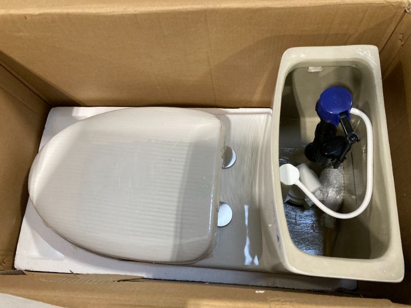 Photo 1 of ***UPDATED 5/1***HOROW One-Piece Elongated Toilet, 1.28 GPF High Efficiency, Easy Cleaning Design, Left-Hand Flush Lever, Soft-Close Seat, Compact Modern Bathroom Toilet, 12'' Rough-In, White Ceramic Bowl