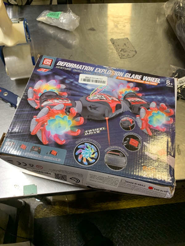 Photo 1 of 1:12 Gesture Sensing RC Stunt Car, 2 * 1200mAh Hand Controlled Remote Control Twist Cars with Light & Music, 4WD 360° Rotate Transform Drift, Gifts for 8-12 Kids Age 8 9 10 11 12 Yrs Old? Trains-Red