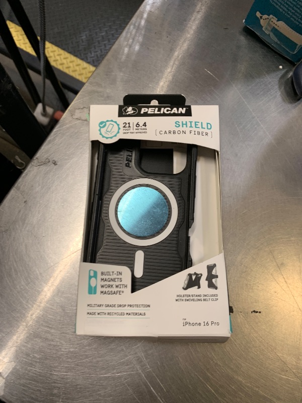 Photo 1 of Pelican Shield iPhone 16 Pro Case [Compatible with MagSafe] Rugged Phone Case w/ 21ft Military-Grade Drop Protection - Heavy Duty Phone Cover w/Belt Clip Holster for iPhone 16 Pro - Carbon