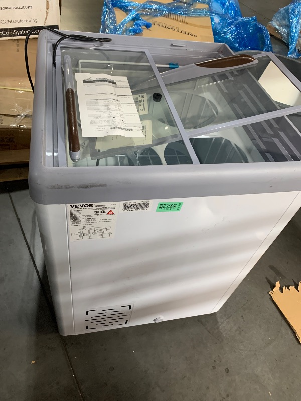 Photo 1 of ***TRUCK/TRAILER PICKUP ONLY***VEVOR Commercial Ice Cream Display Case, 5.6 Cu.ft Chest Freezer, Mobile Glass Top Deep Freezer, Restaurant Gelato Dipping Cabinet, 2 Sliding Glass Doors, Locking Casters, White
