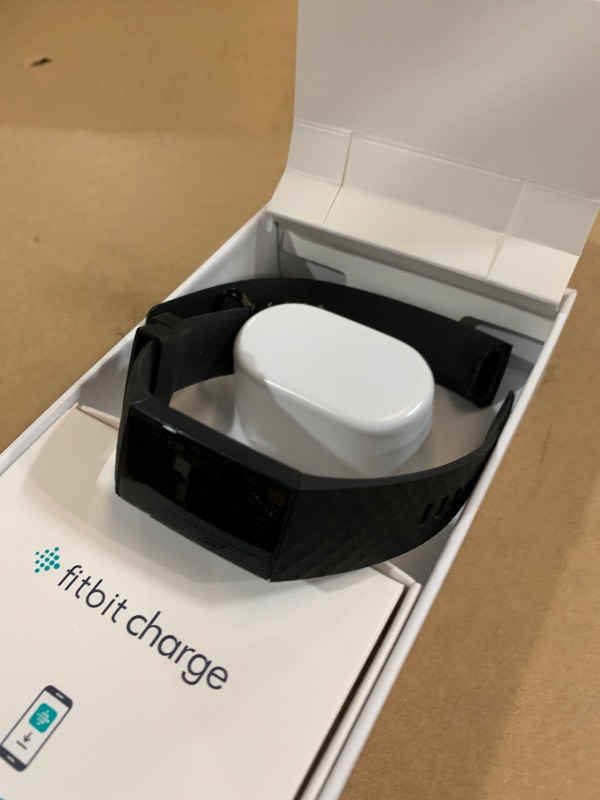 Photo 1 of (used) Fitbit Charge 4 Black Advanced Fitness Tracker