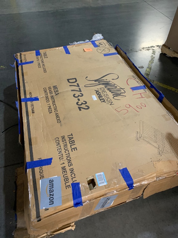 Photo 1 of ***(USED/ UNKNOWN IF MISSING PARTS)***TRUCK/TRAILER PICKUP ONLY***Signature Design by Ashley Havonplane Rustic Distressed Counter Height Dining Extension Table with Removable Center Leaf and Double Trestle Base, Light Brown