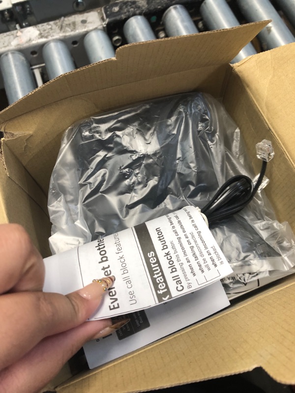 Photo 1 of Panasonic Cordless Phone with Advanced Call Block, Link2Cell Bluetooth, One-Ring Scam Alert, and 2-Way Recording with Answering Machine, 5 Handsets - KX-TGF975B (Black with Silver Trim)