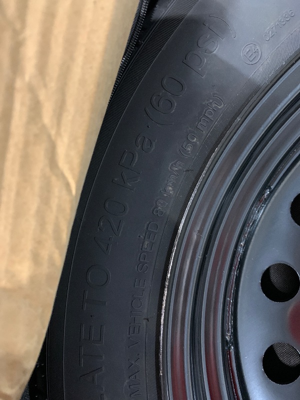 Photo 1 of (used)(please see all images) temporary spare tire