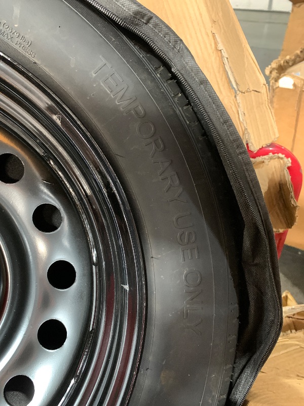 Photo 1 of (used)(please see all images) temporary spare tire