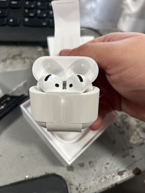 Photo 1 of **PRE OPENED ** Apple AirPods 4 Wireless Earbuds, Bluetooth Headphones, Personalized Spatial Audio, Sweat and Water Resistant, USB-C Charging Case, H2 Chip, Up to 30 Hours of Battery Life, Effortless Setup for iPhone
