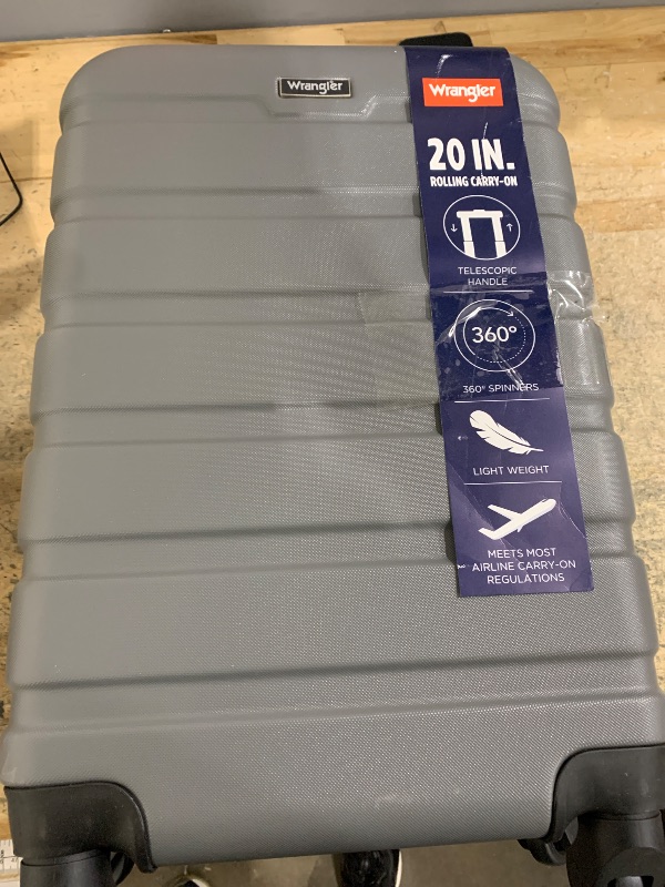 Photo 1 of 
Wrangler 2 0 inch rolling carry on