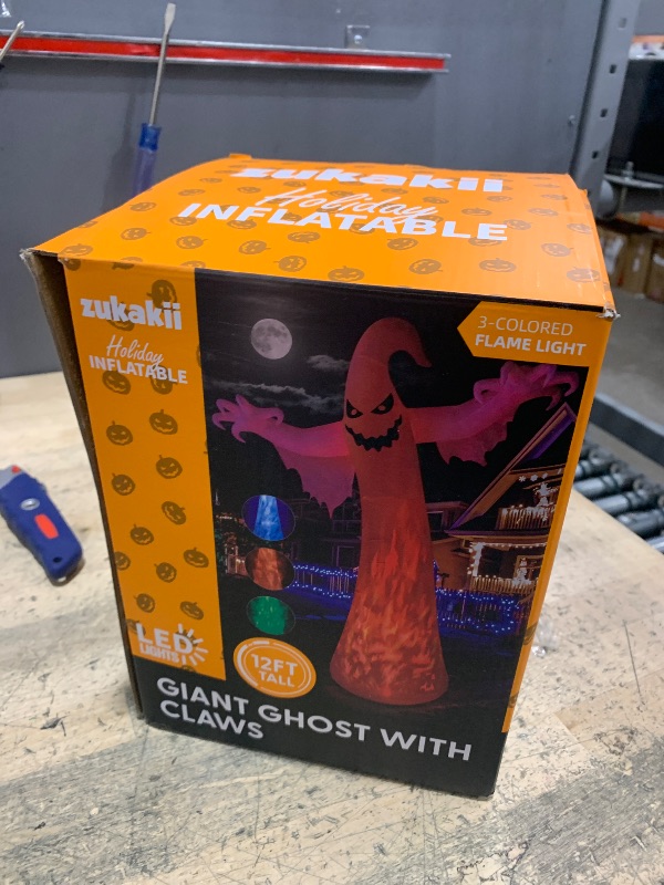 Photo 1 of 12FT Giant Halloween Inflatables Ghost with 3-Colored Flame Rotation LED Lights, Huge Spooky Halloween Decoration Outdoor Large Halloween Blow Up Yard Decorations Tall Blow-ups for Lawn Party (1PCS)