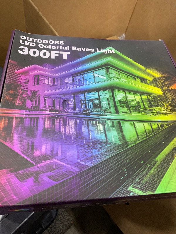 Photo 1 of 300FT Permanent Outdoor RGB Lights - IP67 Waterproof with Smart App Control Remote, DIY Scene Modes, Music Synchronization, Eaves Light for Garden Decor, Deck, Christmas, Party, Party, Halloween,Roof