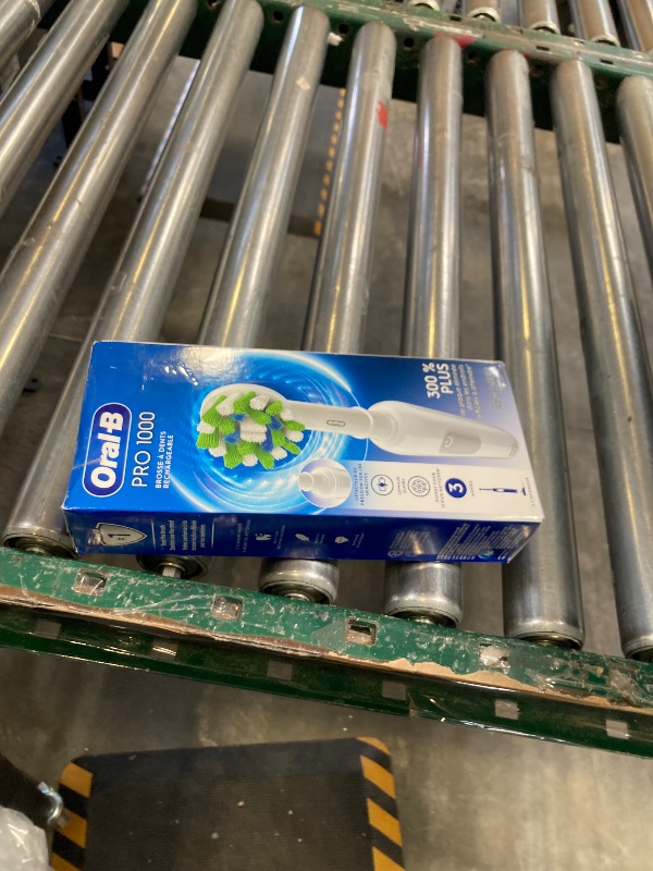 Photo 1 of Oral-B Pro 1000 Rechargeable Electric Toothbrush, White