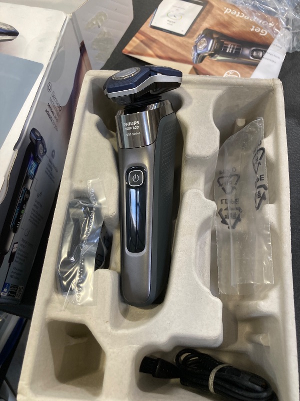Photo 1 of Philips Norelco Shaver 7200, Rechargeable Wet & Dry Electric Shaver with SenseIQ Technology and Pop-up Trimmer, S7887/82