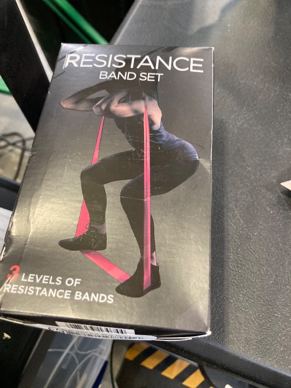 Photo 1 of THERABAND Resistance Bands Set, Beginner Kit, Yellow, Red, Green, Non-Latex Elastic Bands for Exercise & Physical Therapy, Strength Training for Upper & Lower Body Fitness