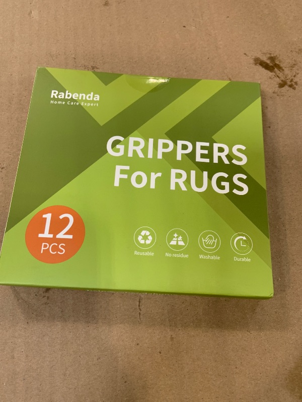 Photo 1 of Rabenda 12 Pcs Rug Tape, Non Slip Rug Pads Grippers for Hardwood Floors and Tiles, Reusable Carpet Tape for Area Rugs, Double-Sided Adhesive Rug Stickers Keep Corners Flat (Black)