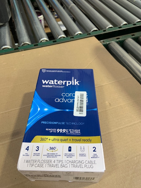 Photo 1 of Waterpik Cordless Advanced 2.0 Water Flosser For Teeth, Gums, Braces, Dental Care With Travel Bag and 4 Tips, ADA Accepted, Rechargeable, Portable, and Waterproof, White WP-580, Packaging May Vary