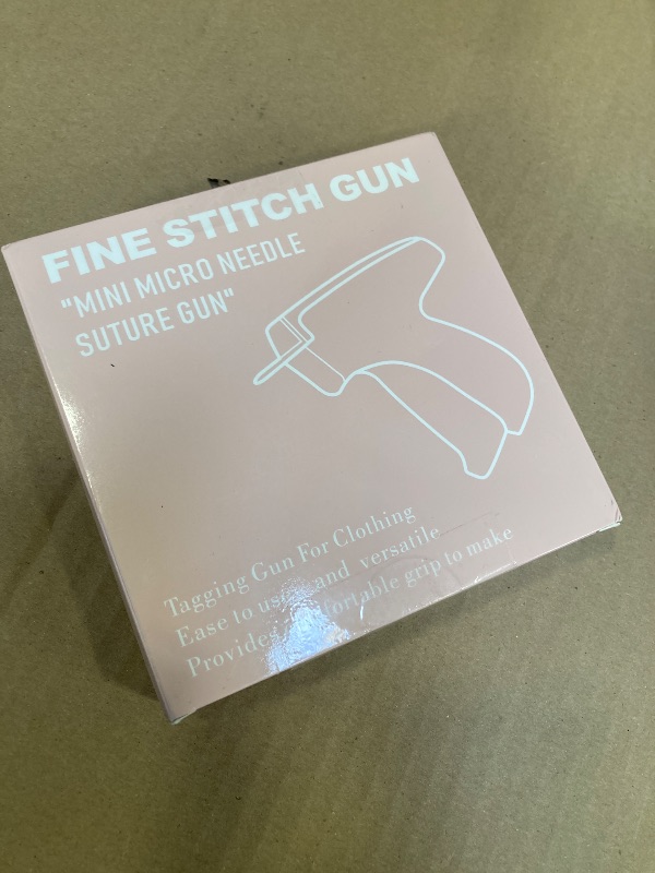 Photo 1 of Stitch  For Clothes? Handheld Stitch Gun Quick Clothing Fixer?Sewing Kit Includes 1,000 Black Fasteners & 1,000 White Fasteners & 6 Needles (Pink)
