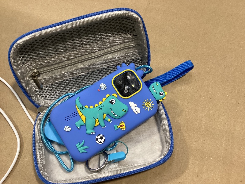 Photo 1 of Kids Smart Phone - Toddler Touchscreen Toy with HD Dual Camera | Dinosaur Travel Play Phone for Boys & Girls Ages 3-10, Birthday (Blue)