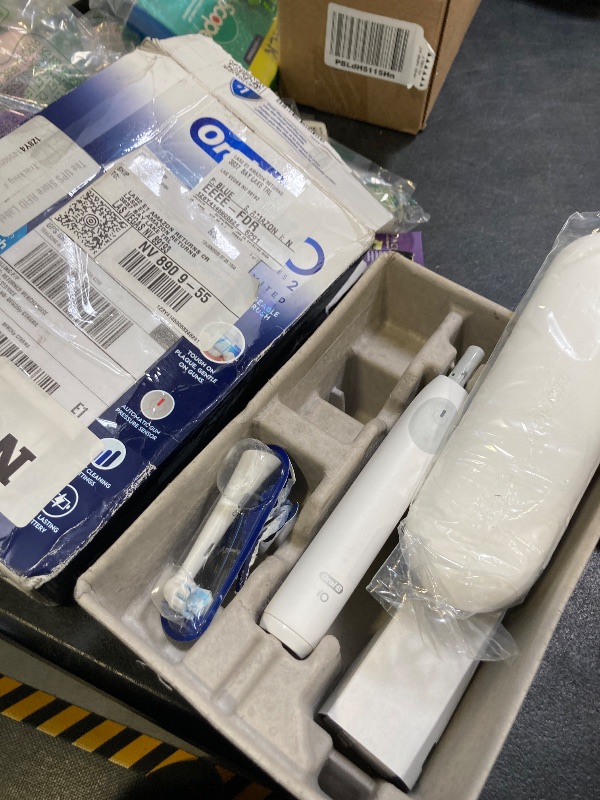 Photo 1 of Oral-B iO Simple Clean Rechargeable Electric Powered Toothbrush, Pure White with 1 Gentle Care Brush Head and 1 White Travel Case - Automatic Pressure Sensor to Protect Gums - 3 Modes -2 Min Timer