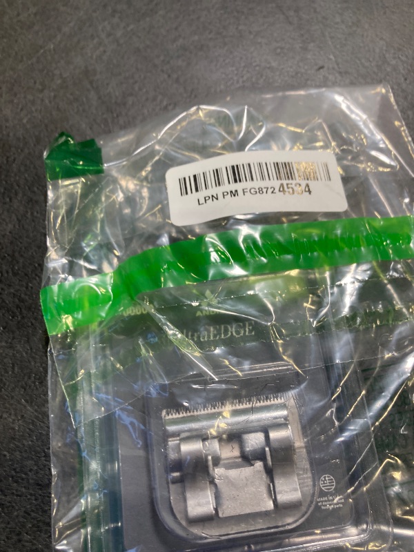 Photo 1 of Andis 64740 Ultra Edge Detachable Clipper Blade – Infused with Carbon Steel, Extends Edge Life, Deep Cutting of Bulky Hairs with Closed Cutting Technique – 0.2mm Cut Length, Chrome