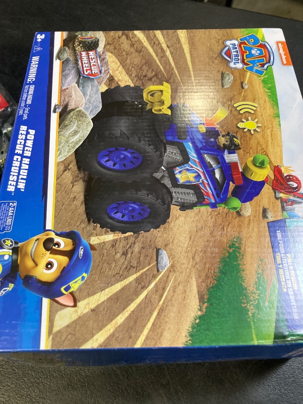 Photo 1 of Paw Patrol: Rescue Wheels Chase’s Power Haulin’ Cruiser, Toy Truck with Launcher, Motorized Winch, Lights & Sounds, Kids Toys for Boys & Girls Ages 3+