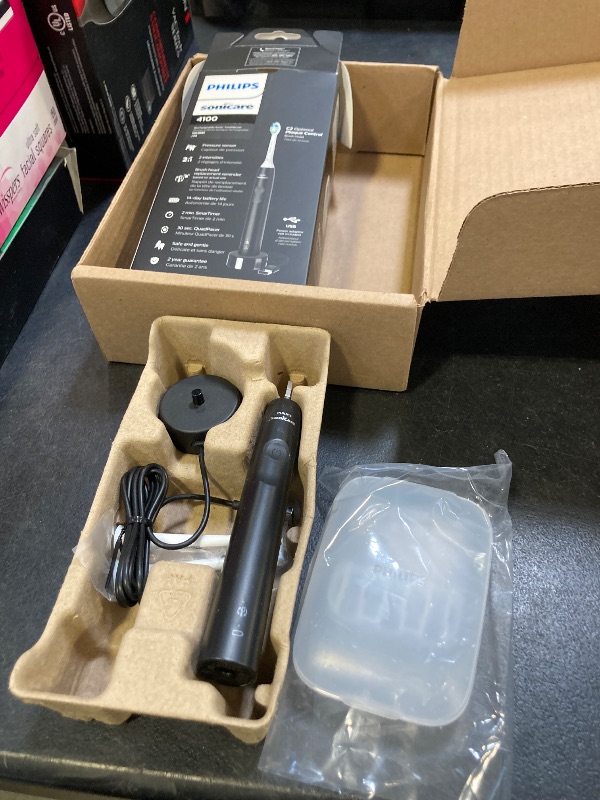Photo 1 of Philips Sonicare 4100 Rechargeable Electric Toothbrush, Advanced Plaque Removal, Pressure Sensor, Includes Brush Head Case, Black BD5003AZ