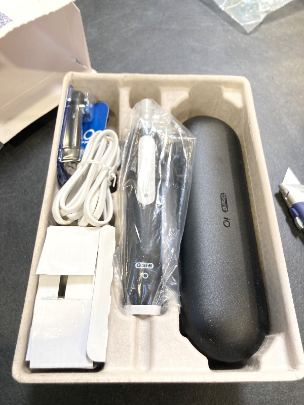Photo 1 of Oral-B iO Deep Clean Rechargeable Electric Toothbrush, Black, iO Series 3 Limited, 2 Brush Heads, Travel Case, Pressure Sensor, 3 Cleaning Settings