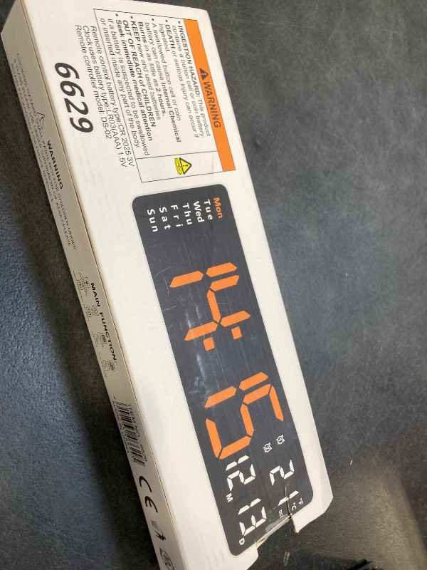 Photo 1 of JoFomp Large Display Digital Alarm Clock for Bedroom, Living Room and Office - LED Electronic Clock with DST, Temperature Display - Dimmer & Battery Backup - Modern Desk and Wall Clock (Orange)