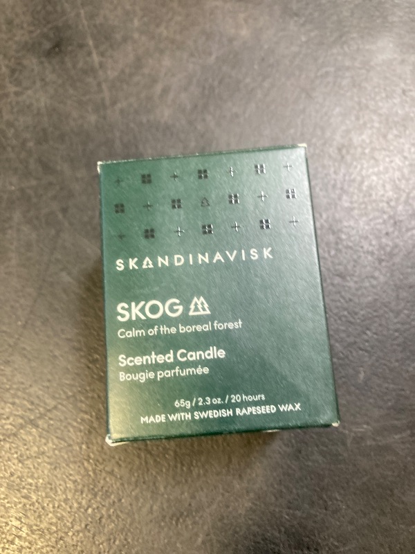 Photo 1 of Skandinavisk Skog 'Forest' Mini Scented Candle. Fragrance Notes: Pine Needles and Fir Cones, Birch Sap and Lily of The Valley. 2.3 oz.