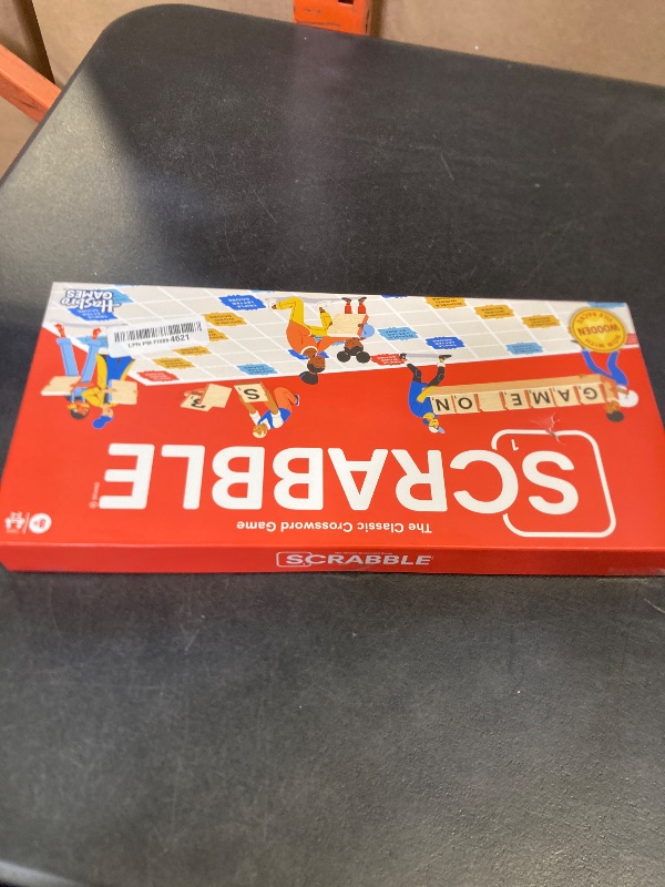 Photo 1 of Hasbro Gaming Scrabble Board Game, Classic Word Games for Kids Ages 8 and Up, Fun Family Game for 2-4 Players, The Classic Crossword Game