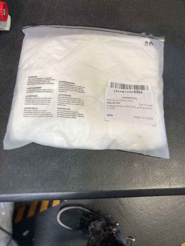 Photo 1 of OYOANGLE Men's Sheer Mesh Short Sleeve Round Neck T Shirts Solid Plain See Through Party Tops Bright White X-Large