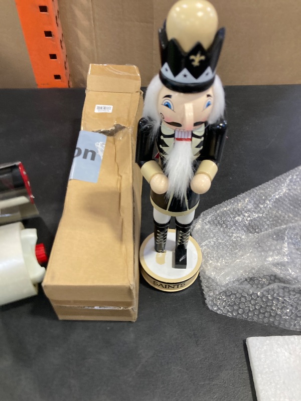 Photo 1 of FOCO NFL New Orleans Saints Team Logo 14" Holiday NutcrackerTeam Logo 14" Holiday Nutcracker, Version 2, One Size