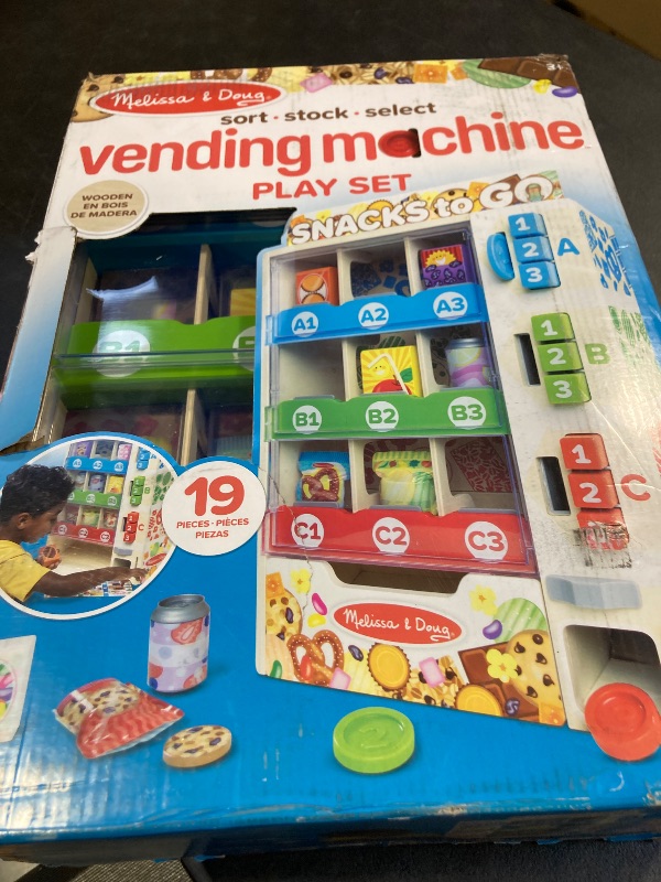 Photo 1 of Melissa & Doug Sort-Stock-Select Wooden Vending Machine Toy with Play Food, Mini Vending Machine Toys & Play Money, Preschool Toys for Kids Ages 3+
