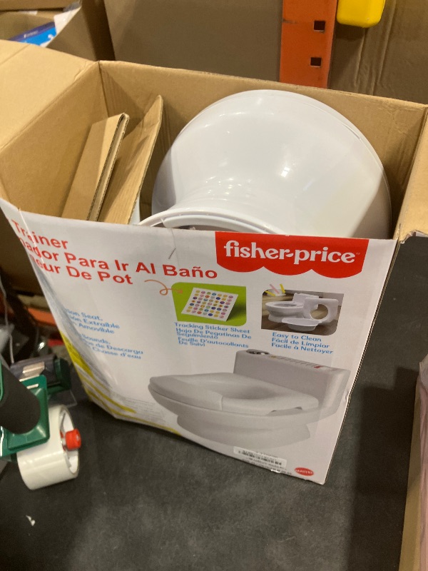 Photo 1 of Fisher-Price™ 2-N-1 Potty Trainer with Flushing Sounds, Chart & Storage – White Floor Potty Chair with Splash Guard, Removable Ring & Bowl, Patented Snap Safe Ring Technology