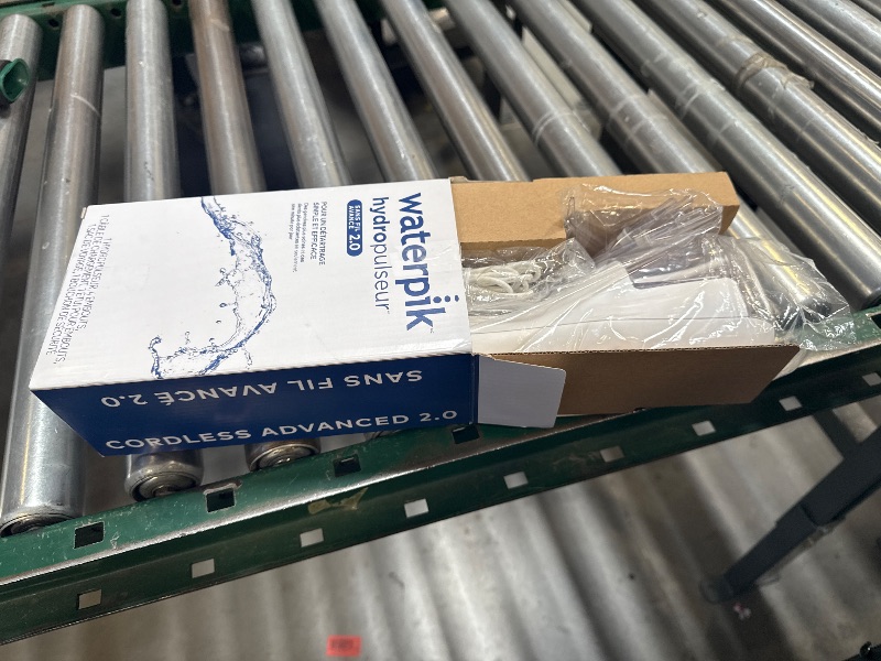 Photo 1 of Waterpik Cordless Advanced 2.0 Water Flosser For Teeth, Gums, Braces, Dental Care With Travel Bag and 4 Tips, ADA Accepted, Rechargeable, Portable, and Waterproof, White WP-580, Packaging May Vary