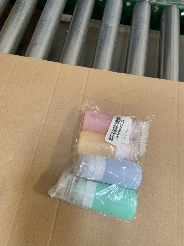 Photo 1 of 4Pcs Condiment Squeeze Bottles for Sauces, Leakproof Salad Dressing Container to Go, Small Silicone Squeeze Bottles with Brush, Condiment Containers Dispenser for Ketchup Hot Sauce Lunch Travel, 2 Oz