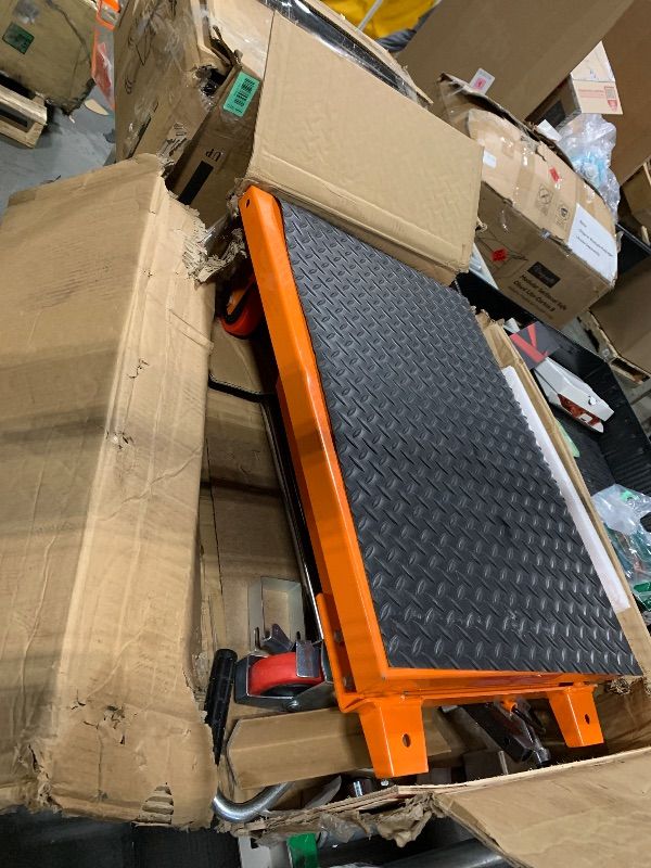 Photo 1 of ****It doesn't have a manual.***** VEVOR Hydraulic Lift Table Cart, 330lbs Load Capacity 50 Inch Lifting Height, Manual Single Scissor Lift Table with Non-Slip Pad and 4 Wheels, Hydraulic Scissor Cart for Material Handling, Orange