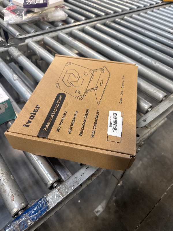 Photo 1 of ***MISSING PIECES*** ***READ CLERK NOTES*** ivoler Adjustable Laptop Stand with 360° Rotating Base, Ergonomic Laptop Stand for Desk, Foldable & Portable Laptop Riser, Suitable for Collaborative Work, Fit MacBook Laptops up to 16 inches[Black]