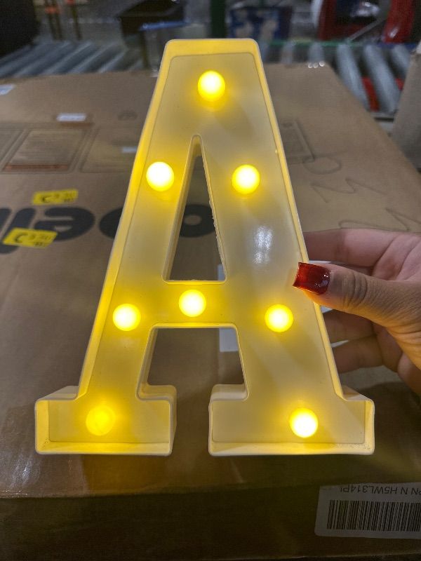 Photo 1 of **CRACKED ON THE BOTTOM, STILL FUNCTIONS** TRONSBOO LED Marquee Sign Light Up Letters, Alphabet Light Up Letters Sign, Battery Powered LED Letter Lights for Night Light, Wedding, Birthday, Party, Christmas or Home Decor (Letter A)