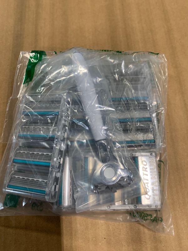 Photo 1 of *** 15 REFILL *** Schick Quattro Titanium 4-Blade Razors for Men | 1 Mens Razor Handle and 16 Refill Blades for Shaving