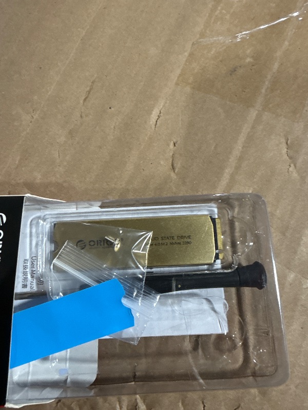 Photo 1 of *** MISSING ONE***ORICO X7000 2TB NVMe SSD for Gaming, 7400MB/s Read Speed, 17?s Response Time, PCIe Gen 4 Internal Drive, PS5 & PC Compatibility, Comes with Heatsink for Enhanced Cooling and Multitasking