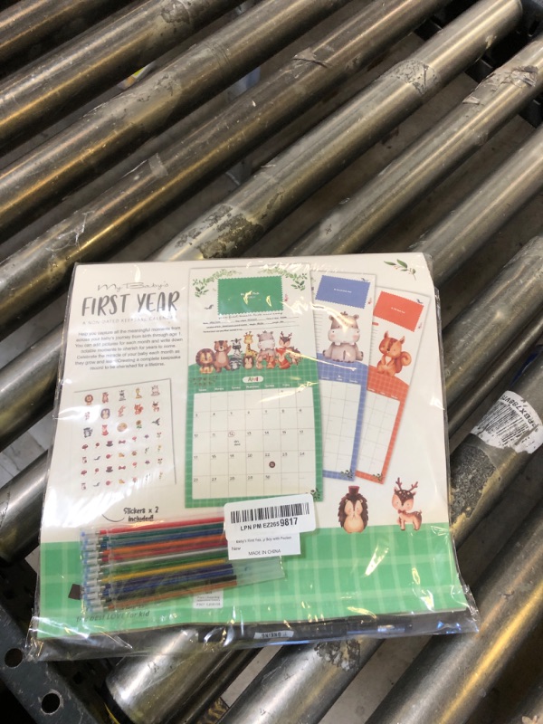 Photo 1 of Baby's First Year Calendar with Stickers by Bright Day - 1st Year Tracker - Baby Memory Book for Girls to Document and Cherish Baby First Year Milestones,- Milestone Keepsake for Baby Boy with Pocket