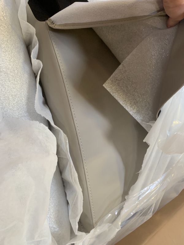 Photo 1 of Signature Design by Ashley Boyington Contemporary Leather Match Power Reclining Loveseat with Console and USB Charging Ports, LED Lights and Adjustable Headrest, Light Gray