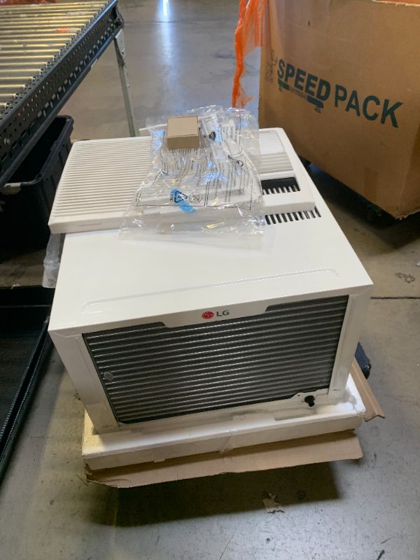Photo 1 of LG 23,000 BTU Window Air Conditioner with Heat, 230V, AC Heater Combo Window Unit for Rooms up to 1400 Sq. Ft., Perfect for Living Room, Den, Bedroom, or Office, AC Heater Window Unit with Remote