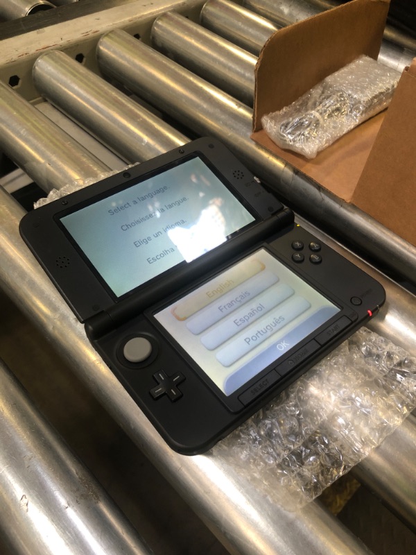 Photo 1 of Nintendo 3DS XL Handheld System - Black/Blue (Renewed) [Nintendo DS]