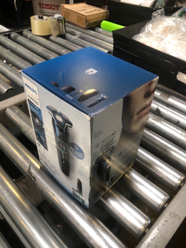 Photo 1 of Philips Norelco Shaver 7800, Rechargeable Wet & Dry Electric Shaver with SenseIQ Technology, Quick Clean Pod, Charging Stand, Travel Case and Pop-up Trimmer, S7885/85