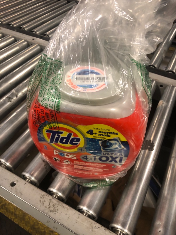 Photo 1 of Tide PODS Liquid Laundry Detergent Soap Pacs, 4-n-1 Ultra Oxi, HE Compatible, Built in Pre-treater for Stains, 57 Count
