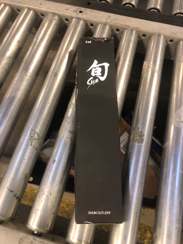 Photo 1 of Shun Premier 8" Chef's Knife, Handcrafted Japanese Kitchen Knife for Professional and Home Chefs, VG-MAX Core with Damascus Stainless Steel Cladding, Pakkawood Handle